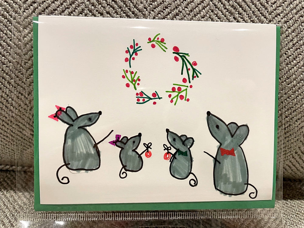 mice family decorating their wreath